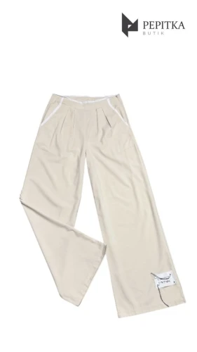 Spodnie beżowe z surowym wykończeniem #133